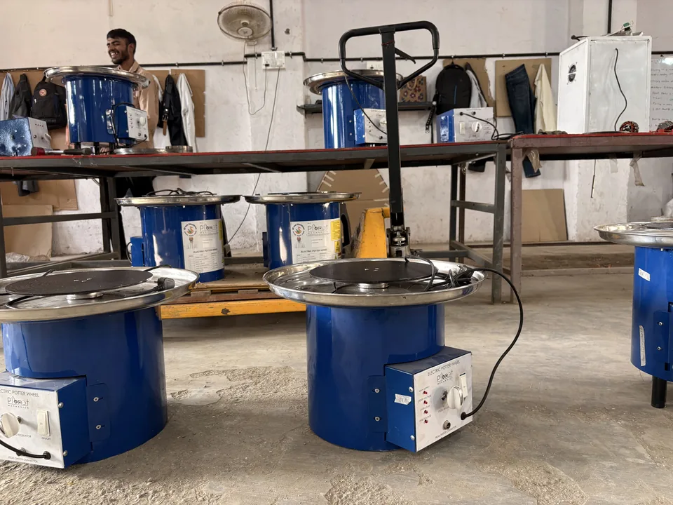 Source photograph of workshop equipment and materials beside a workbench